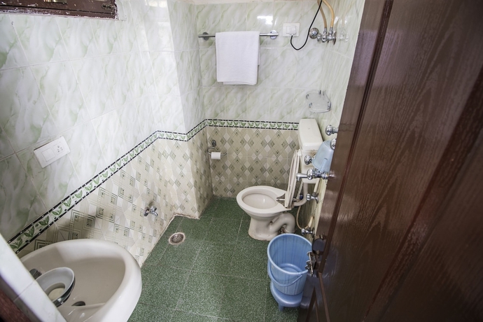 Imagen de la habitación del Hotel Utsang Guest House. Foto 17