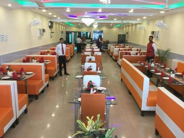 Imagen del bar/restaurante del Hotel Utsav Residency. Foto 20