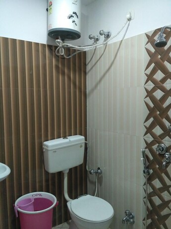 Imagen de la habitación del Hotel Utsav Residency. Foto 25
