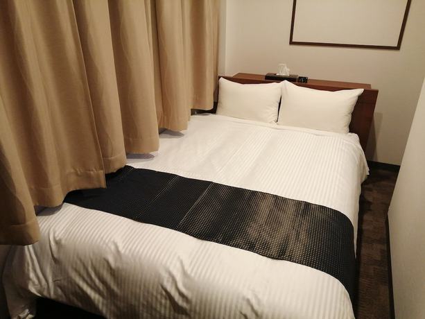 Imagen de la habitación del Hotel Utsunomiya Higashi. Foto 2