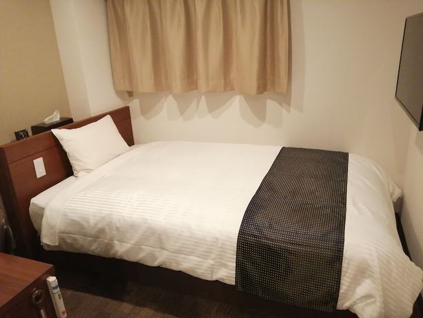 Imagen de la habitación del Hotel Utsunomiya Higashi. Foto 3