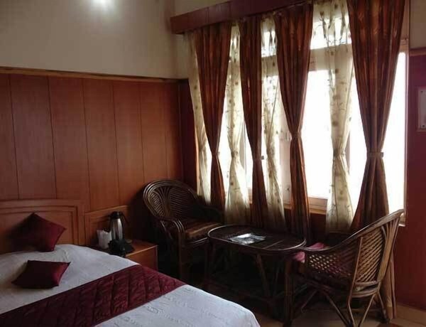 Imagen de la habitación del Hotel Uttarakhand. Foto 3