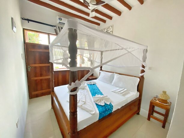 Imagen de la habitación del Hotel Utulivu Bungalow. Foto 19