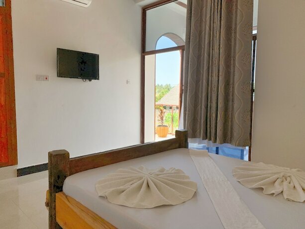 Imagen de la habitación del Hotel Utulivu Bungalow. Foto 20