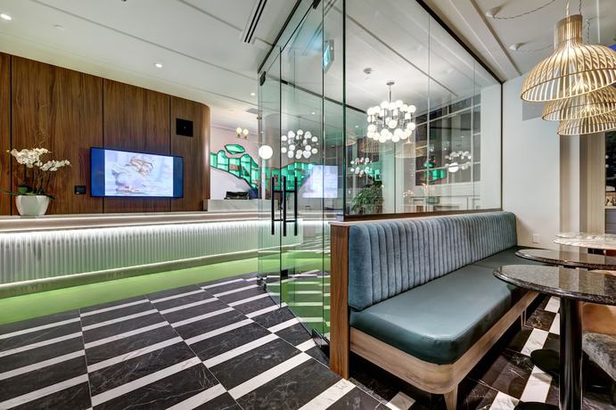 Imagen del bar/restaurante del Hotel Uville Montreal. Foto 3