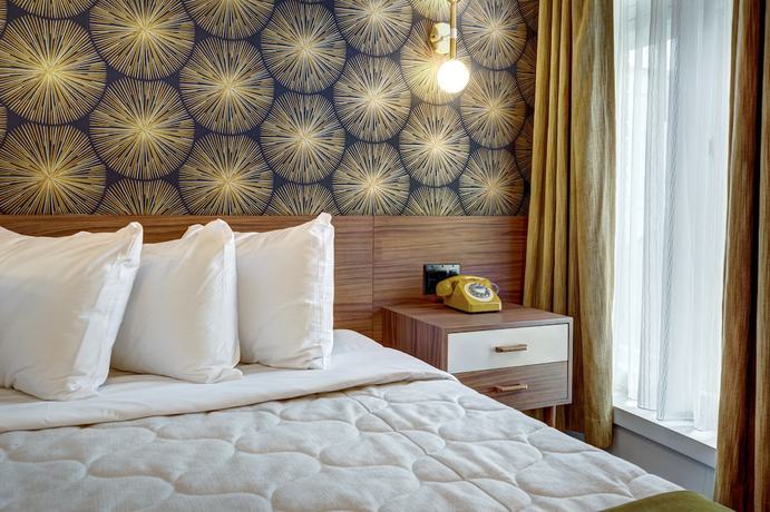 Imagen de la habitación del Hotel Uville Montreal. Foto 13