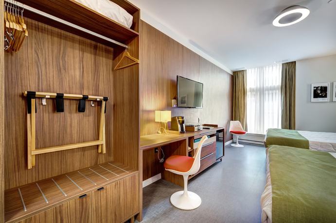Imagen de la habitación del Hotel Uville Montreal. Foto 19