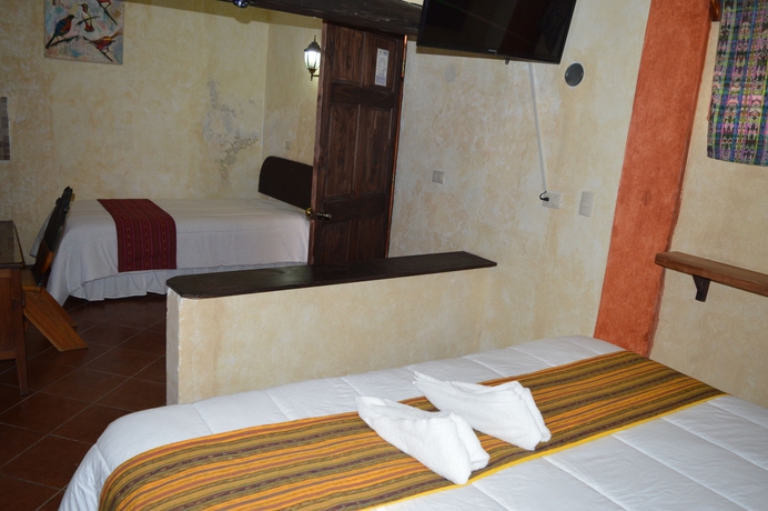 Imagen de la habitación del Hotel Uxlabil Antigua Galer&iacute;a. Foto 4