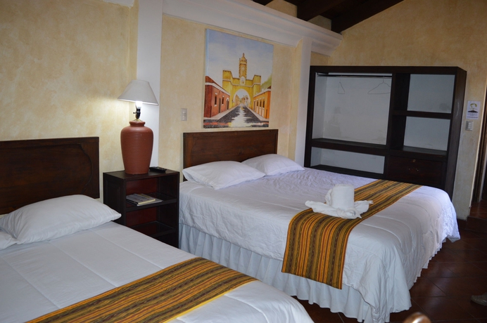 Imagen de la habitación del Hotel Uxlabil Antigua Galer&iacute;a. Foto 5