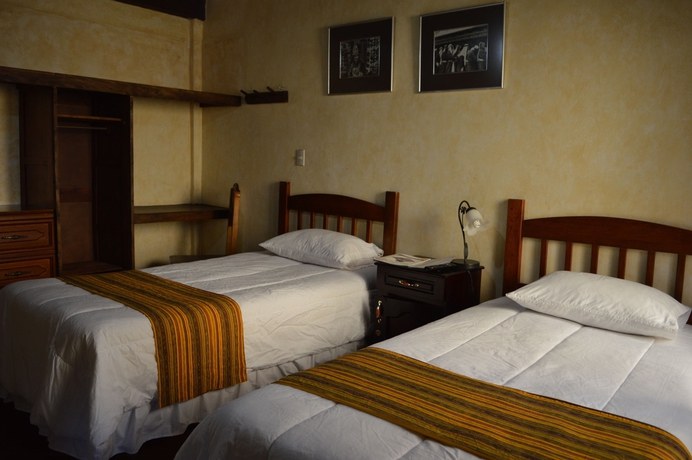 Imagen de la habitación del Hotel Uxlabil Antigua Galer&iacute;a. Foto 8