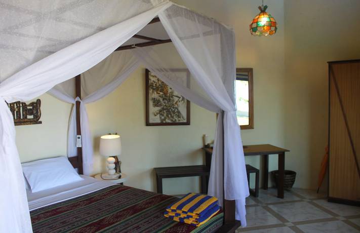 Imagen de la habitación del Hotel Uyah Amed and Spa Resort. Foto 4