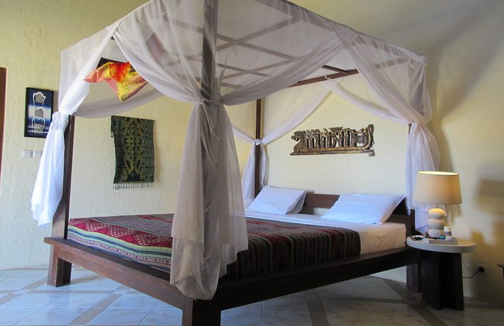 Imagen de la habitación del Hotel Uyah Amed and Spa Resort. Foto 10