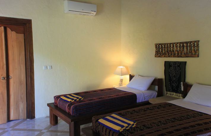 Imagen de la habitación del Hotel Uyah Amed and Spa Resort. Foto 11