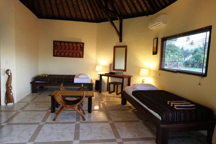 Imagen de la habitación del Hotel Uyah Amed and Spa Resort. Foto 12