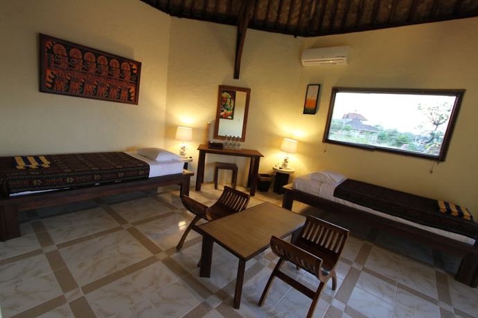 Imagen de la habitación del Hotel Uyah Amed and Spa Resort. Foto 14