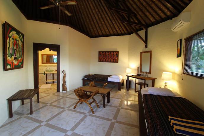 Imagen de la habitación del Hotel Uyah Amed and Spa Resort. Foto 15