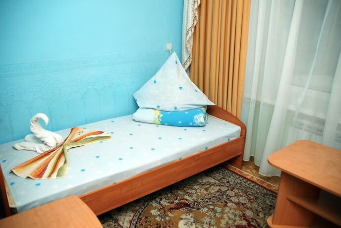 Imagen de la habitación del Hotel Uyutniy Dom. Foto 15