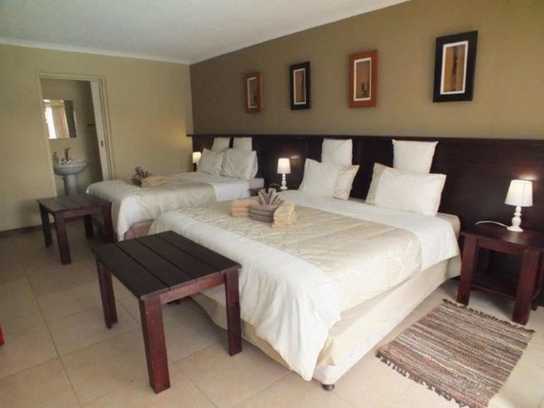 Imagen de la habitación del Hotel Uzuri Guesthouse. Foto 13