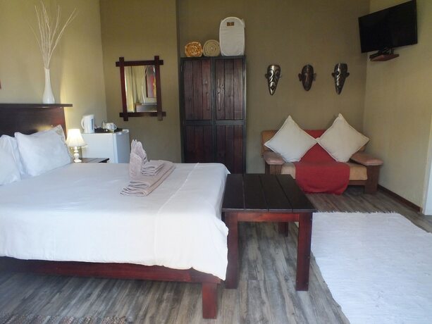 Imagen de la habitación del Hotel Uzuri Guesthouse. Foto 14