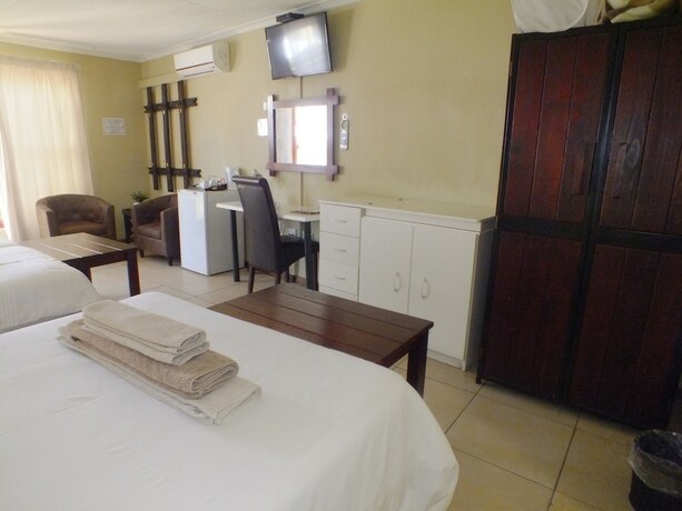 Imagen de la habitación del Hotel Uzuri Guesthouse. Foto 20