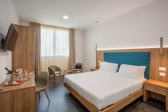 Imagen de la habitación del Hotel V, ANCONA. Foto 18