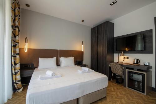 Imagen de la habitación del Hotel V Center. Foto 19