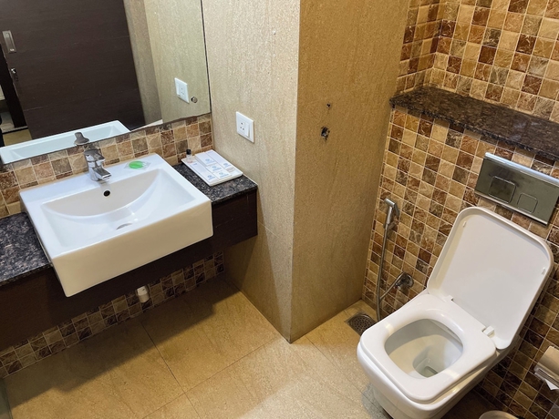 Imagen de la habitación del Hotel V Club Sohna Road. Foto 11