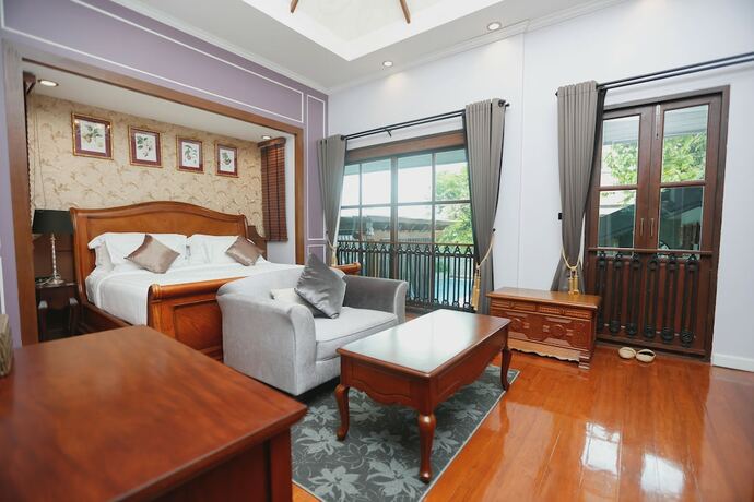 Imagen de la habitación del Hotel V Heritage Villa Chiang Mai. Foto 3