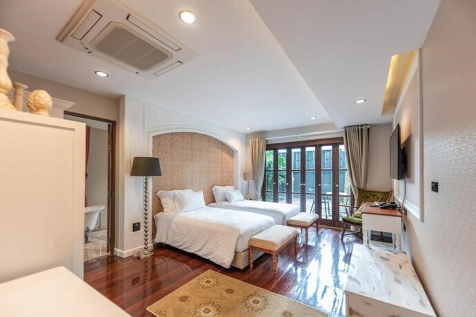Imagen de la habitación del Hotel V Heritage Villa Chiang Mai. Foto 5