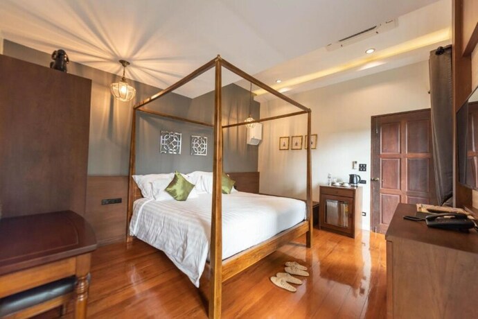 Imagen de la habitación del Hotel V Heritage Villa Chiang Mai. Foto 12