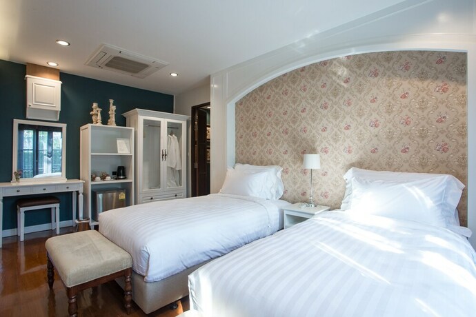 Imagen de la habitación del Hotel V Heritage Villa Chiang Mai. Foto 14