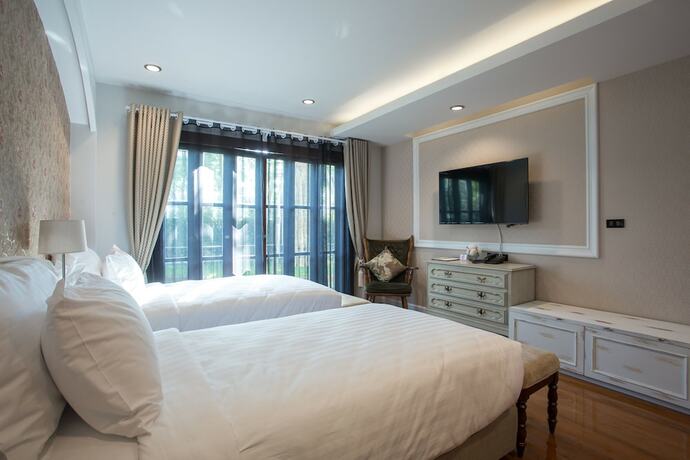 Imagen de la habitación del Hotel V Heritage Villa Chiang Mai. Foto 16