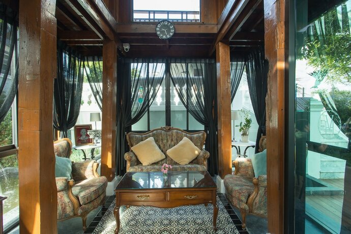 Imagen de los interiores del Hotel V Heritage Villa Chiang Mai. Foto 20