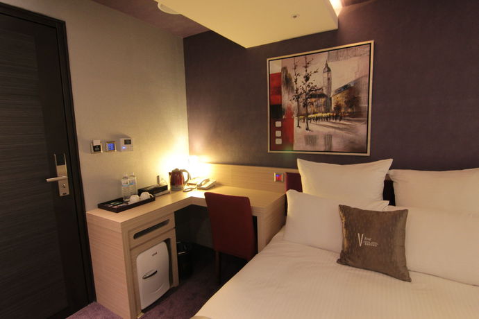 Imagen de la habitación del Hotel V One. Foto 7