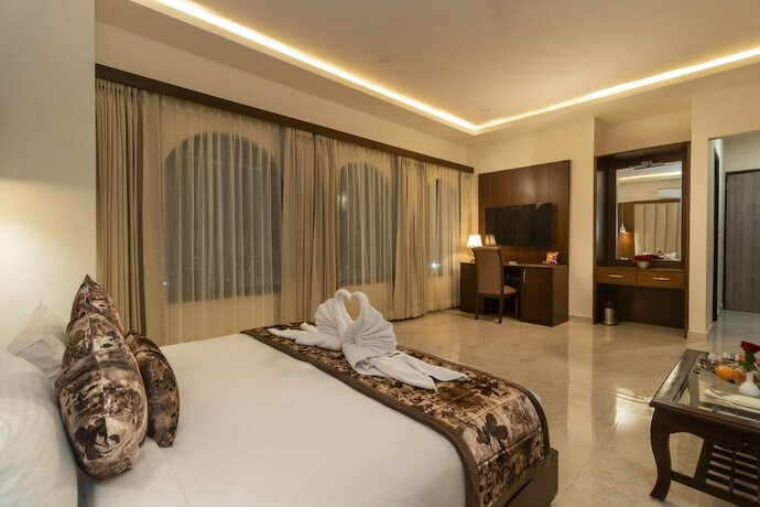 Imagen de la habitación del Hotel V One Pride, Dehradun. Foto 16