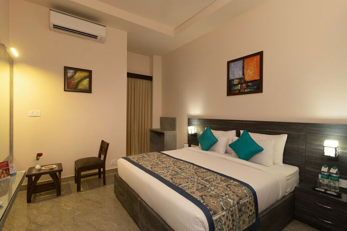 Imagen de la habitación del Hotel V One Pride, Dehradun. Foto 17