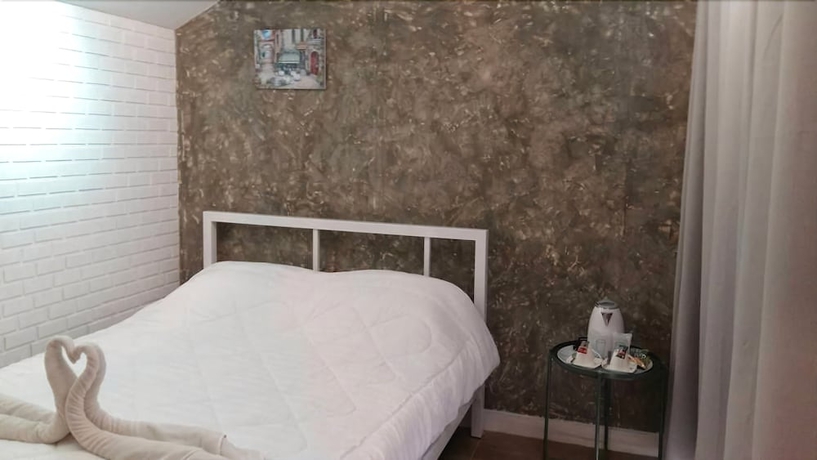 Imagen de la habitación del Hotel V Village. Foto 4