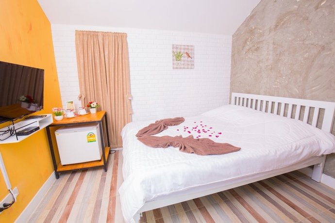 Imagen de la habitación del Hotel V Village. Foto 5