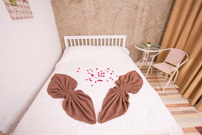 Imagen de la habitación del Hotel V Village. Foto 6