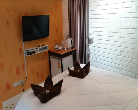 Imagen de la habitación del Hotel V Village. Foto 9