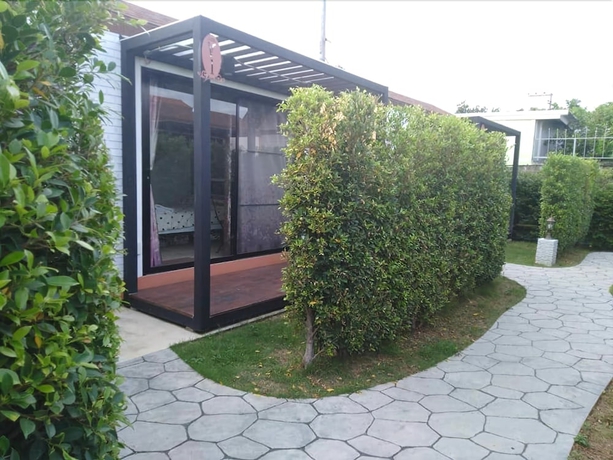 Imagen de la habitación del Hotel V Village. Foto 10