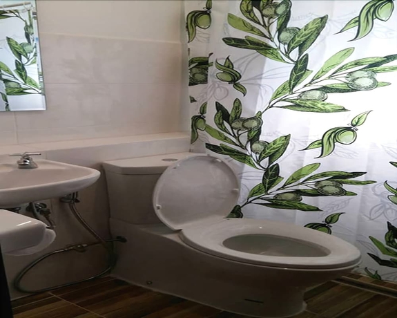 Imagen de la habitación del Hotel V Village. Foto 11