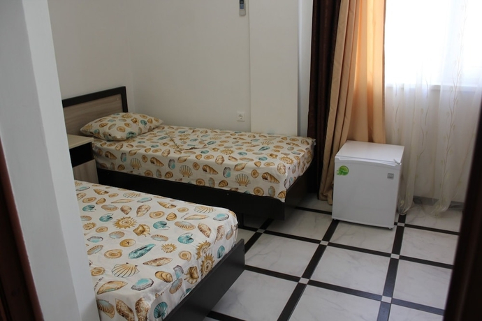 Imagen de la habitación del Hotel V gostiah u Svetlani Guest House. Foto 7