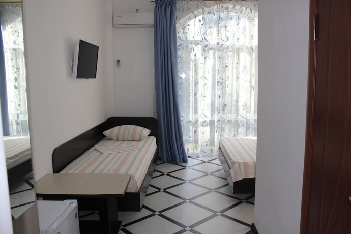 Imagen de la habitación del Hotel V gostiah u Svetlani Guest House. Foto 14
