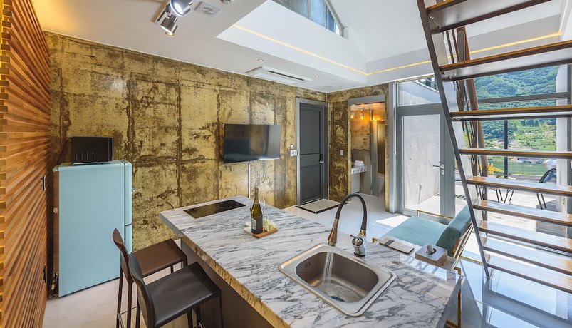 Imagen de la habitación del Hotel V10 Spa Pension. Foto 17