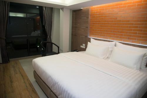 Imagen de la habitación del Hotel V20boutique Jacuzzi. Foto 7