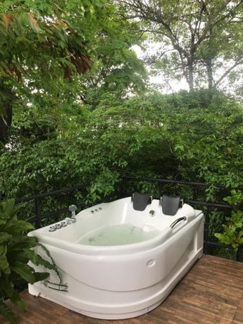 Imagen de la habitación del Hotel V20boutique Jacuzzi. Foto 10