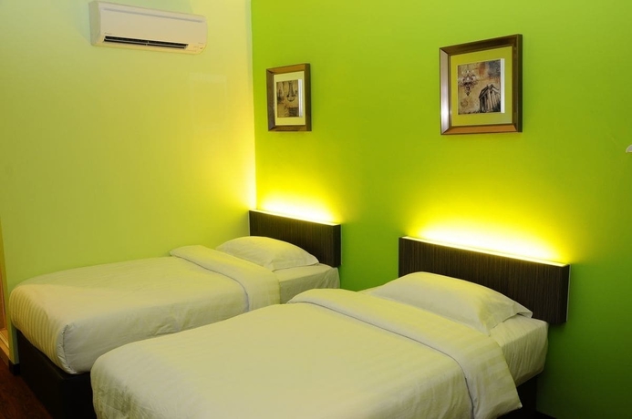Imagen de la habitación del Hotel V3 Taman Gaya. Foto 4