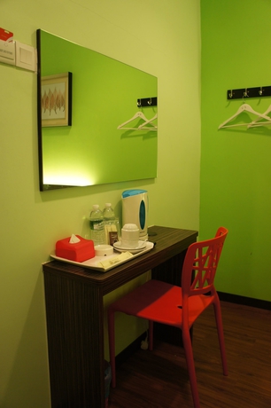 Imagen de la habitación del Hotel V3 Taman Gaya. Foto 5