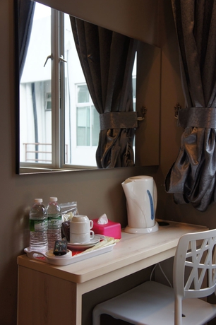 Imagen de la habitación del Hotel V3 Taman Gaya. Foto 6